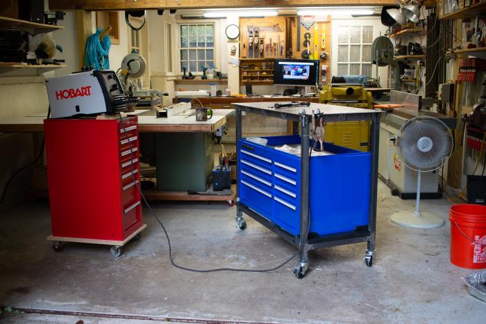 What my welding cart looked like before I did my welding cart build on this forum. Very effective on that wooden dolly.