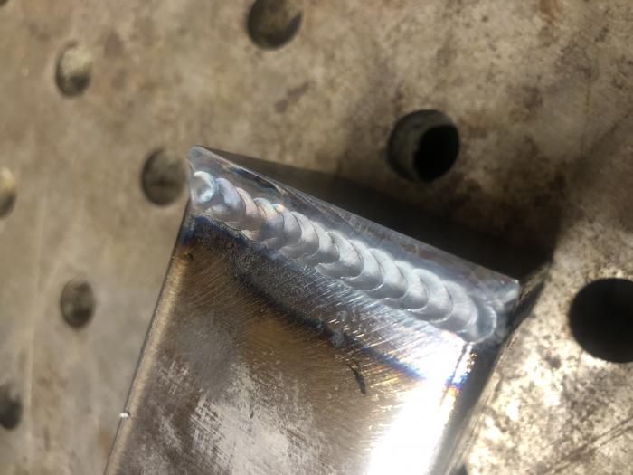 2”x2”x3/16” tubing with a 3/16 flat stock fusion welded with pulse